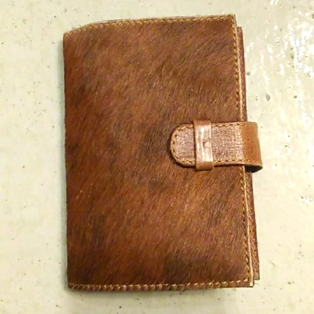 Nwot brown genuine cowhide Bible/book cover Included is a New Testament Bible.